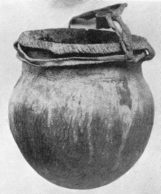 b. Mandan earthenware jar, collected by Drs. Gray and Matthews. (U.S.N.M. 8407)