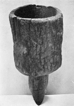 b. Wooden mortar. "Witchata Inds. Dr. E. Palmer." Height of body 13½ inches. (U.S.N.M. 6899)