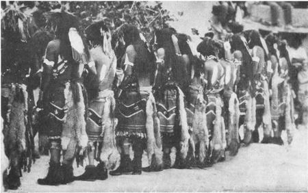 Figure 10.—Snake Priests in Front of Kisa.
